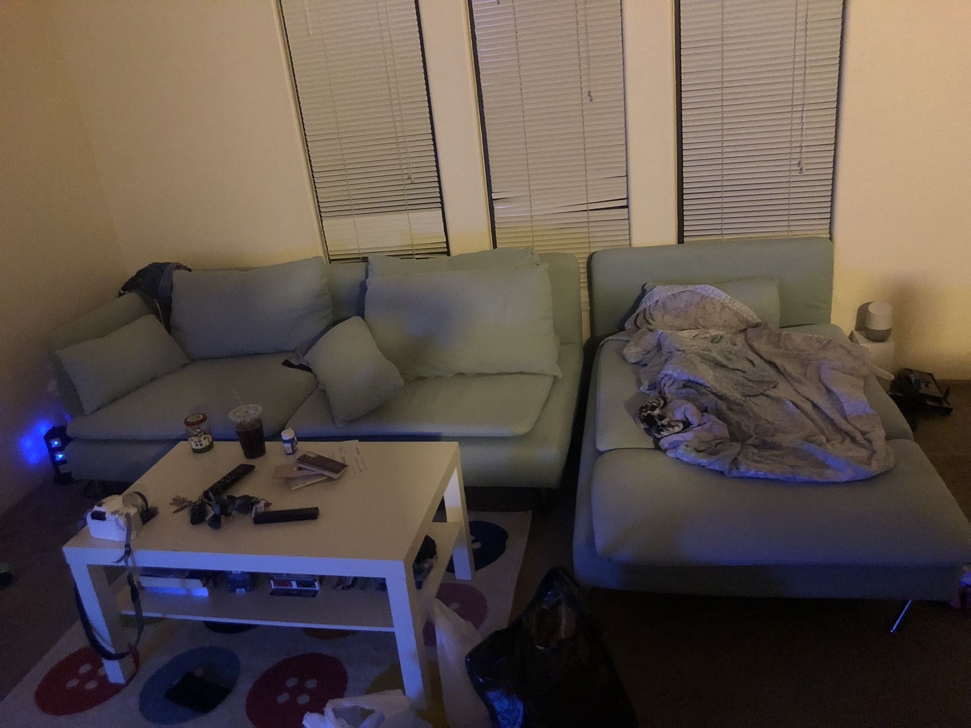 IKEA sofa and two white tables. Has cat scratch.