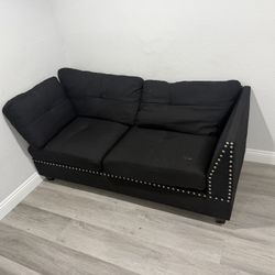 Two Black Sofas & Ottoman 
