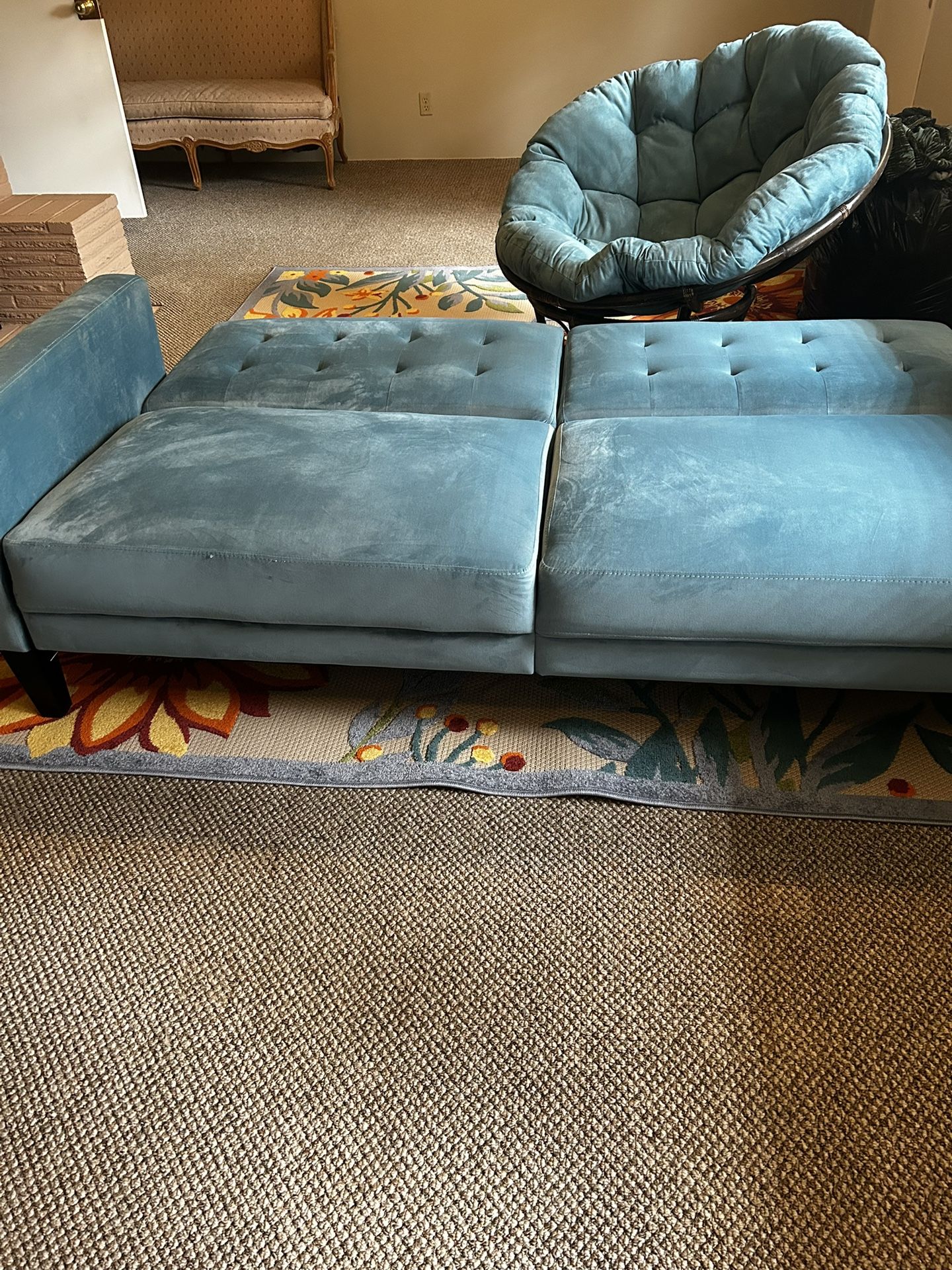 Sofa Bed, Chair, And Rug
