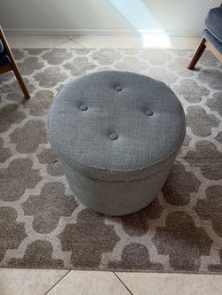 Round Gray Tufted Storage Ottoman