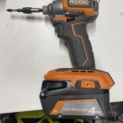 Ridgid 18v sub compact 1/4” Hex impact drill with Max output 4 ah amp battery
