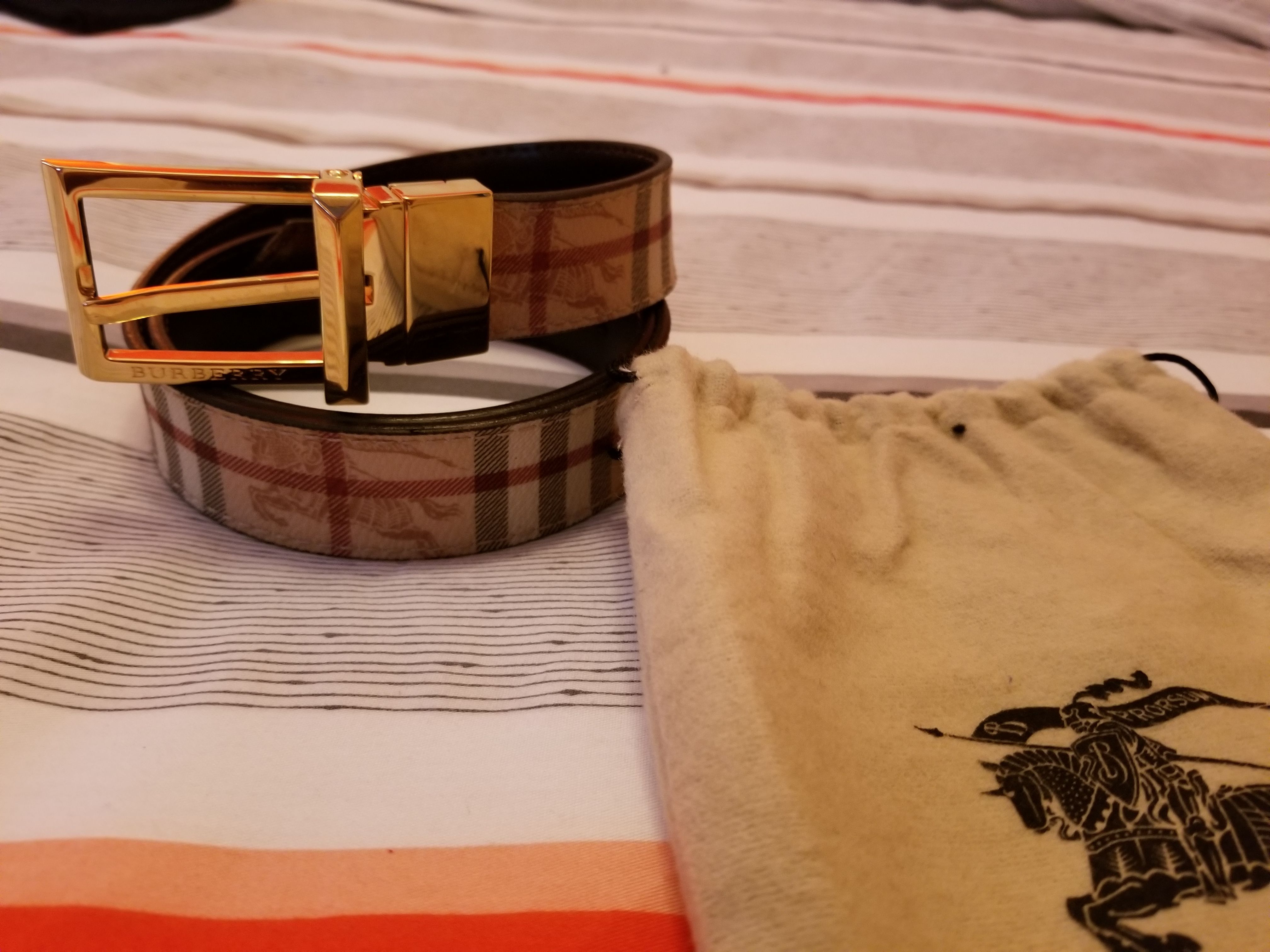 Burberry belt with dust bag,brand new.