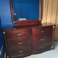 Dresser with 6 drawers and mirror. Asking $200 or best offer. Motivated to sell.
