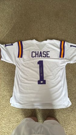 Signed LSU Ja’Marr Chase jersey with COA sticker