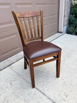 Wood Vintage Dining Chair with Brown Upholstered Faux Leather Seat