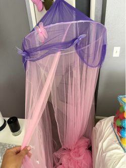 Butterfly canopy over bed. Girls room
