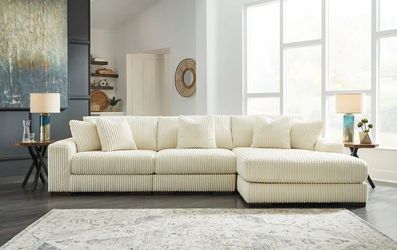 A904 Ivory- Ashley Lindyn Ivory 3-Piece RAF Chaise Sectional