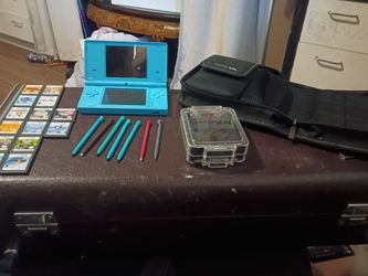 Nintendo DSi Bundle with Games and Accessories