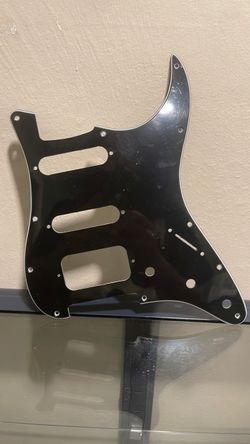 Stratocaster pick guard new with plastic film