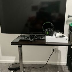 TV, XBOX S (w 1TB storage), Stand comes included.