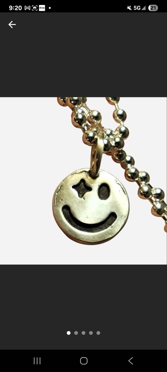 999 Silver Starry Eyed Charm / Amulet / Pendant 

- 15mm

- New 

- Unisex

 - 1.10g in weight 

Soldered o ring for extra durability 

999 Fine Silve