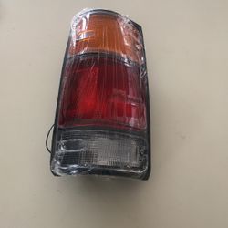 Isuzu IZ Pickup 1988 To 1995 Tail Lamp (Black) Driver Side Assembly 