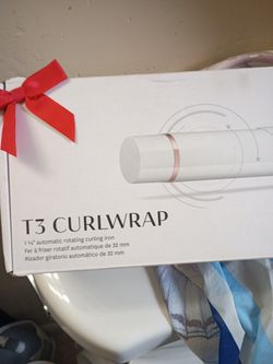 Best Offer Never usedT3 curl wrap one and 1/4 automatic rotating curling iron new in box never used