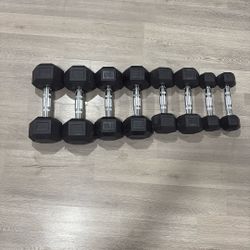 Dumbells 20's,15's,10's, and 5's Full set all together 