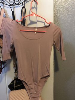 Pink body suit