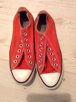 Reddish orange converse