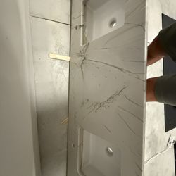 Quartz vanity with dual under mount sinks