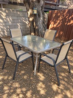 Patio iron and glass table