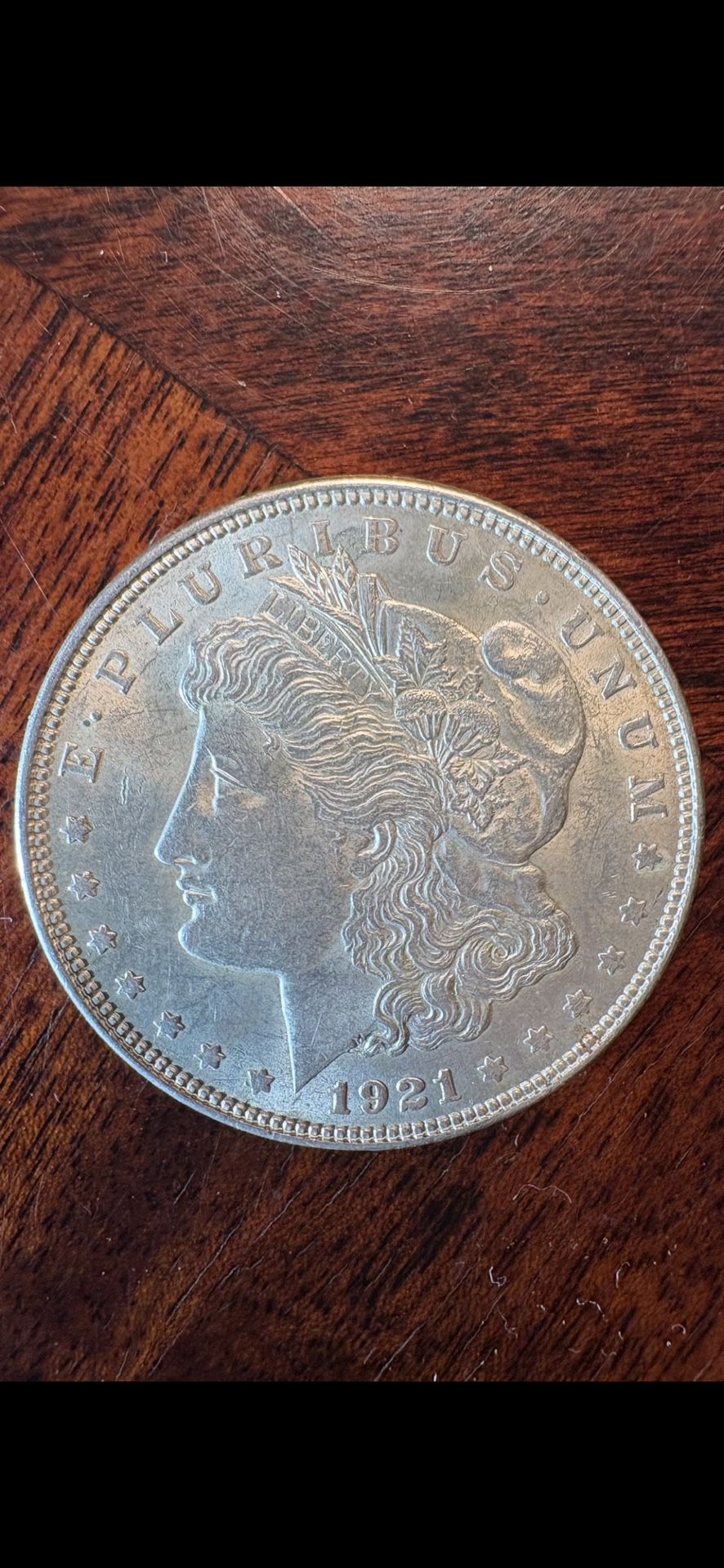1921 Morgan Silver Dollar. AU 90% Silver