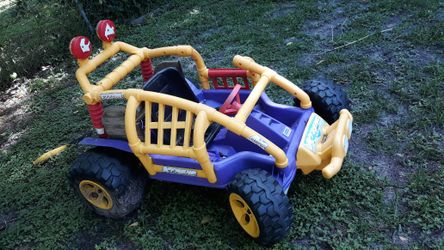 Kids little tykes go art. We hooked it up with a lawn mower battery in back. The switch needs work. I just dont have the time to mess with it.