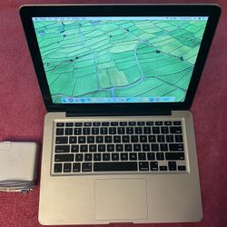 Early 2011 MacBook Pro 13 inch, 2.3 GHz i5, 4 GB RAM, 120 GB SSD. 