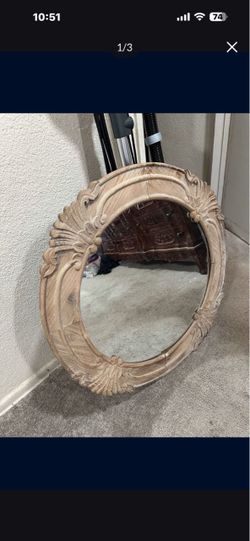 Carved Wood Round Mirror In Excellent used Condition serious buyers only 29” side to side