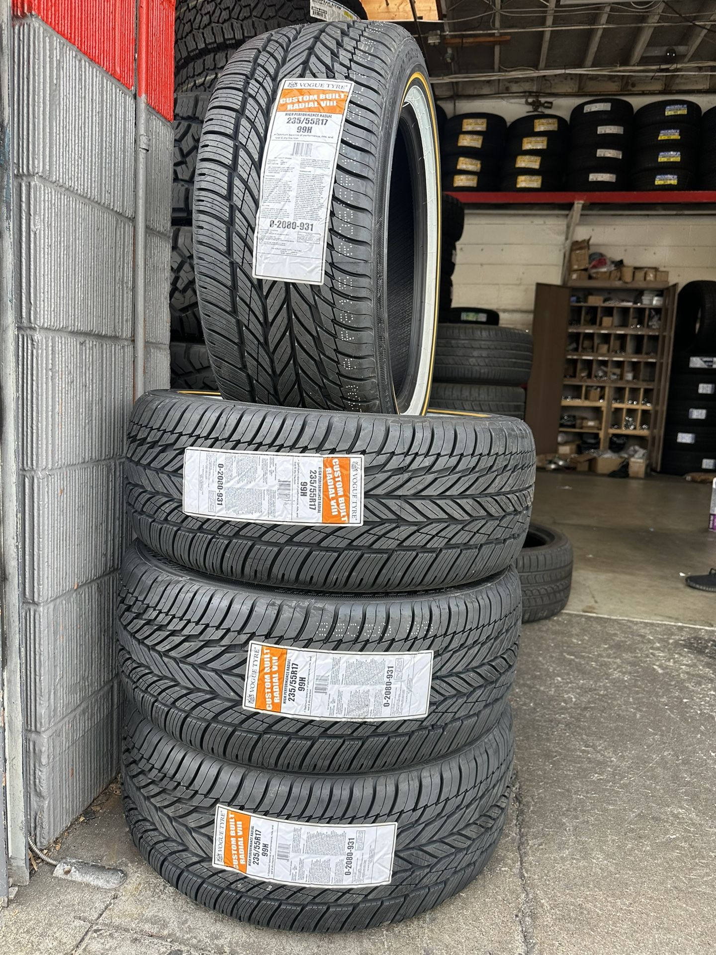 Brand new 235/55R17 Vogue tires white wall with gold stripe available with installation