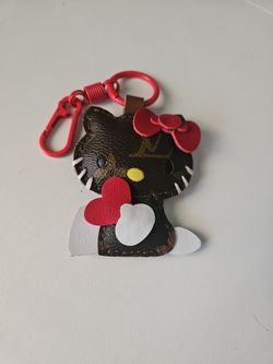 Upcycled with authentic LV material - Hello Kitty