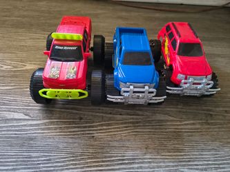 Set of 3 monster truck toys