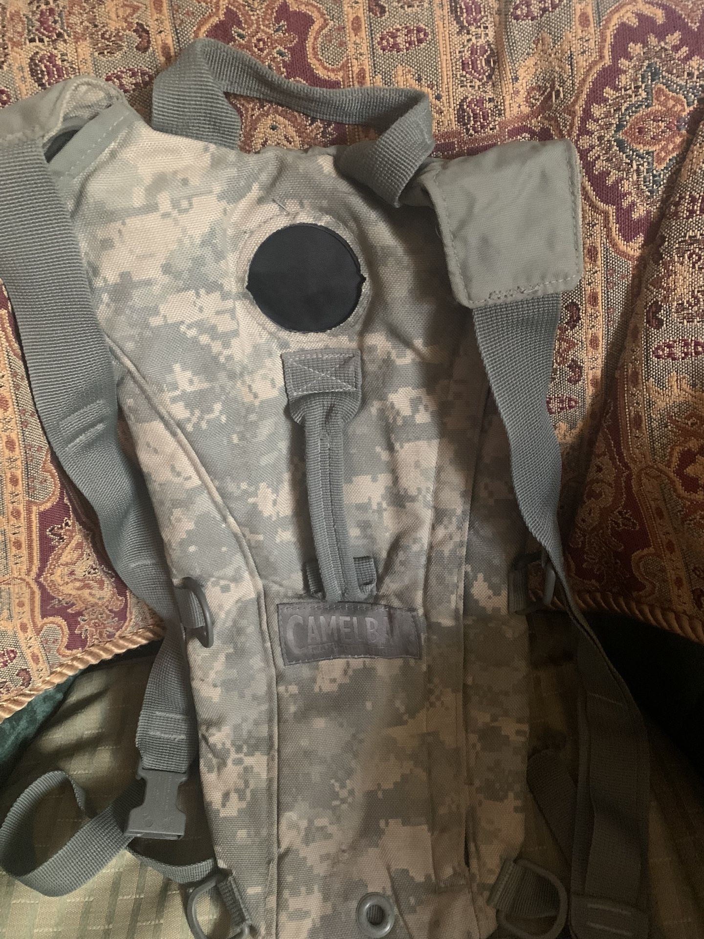 Camelback/military issue.