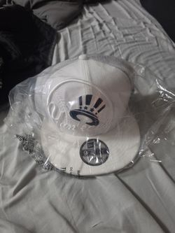 White New Era snapback still in plastic .