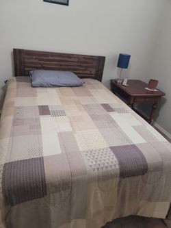 Complete Double bed with wooded headboard  and wood bedframe