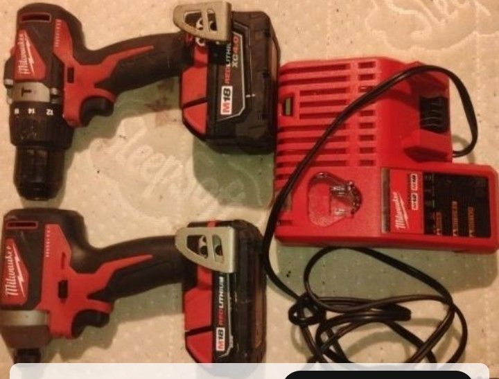 Milwaukee M18 cordless drill and Battery Like New $185