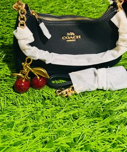 Coach Black Leather Shoulder Bag with Cherry Charm