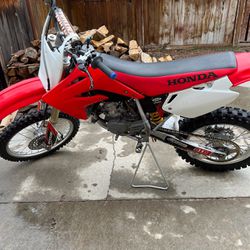 Honda CR85R with a triangle stand