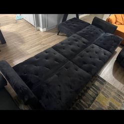 Black velvet buttoned sofa in very good condition, can be converted into a complete futon-style bed