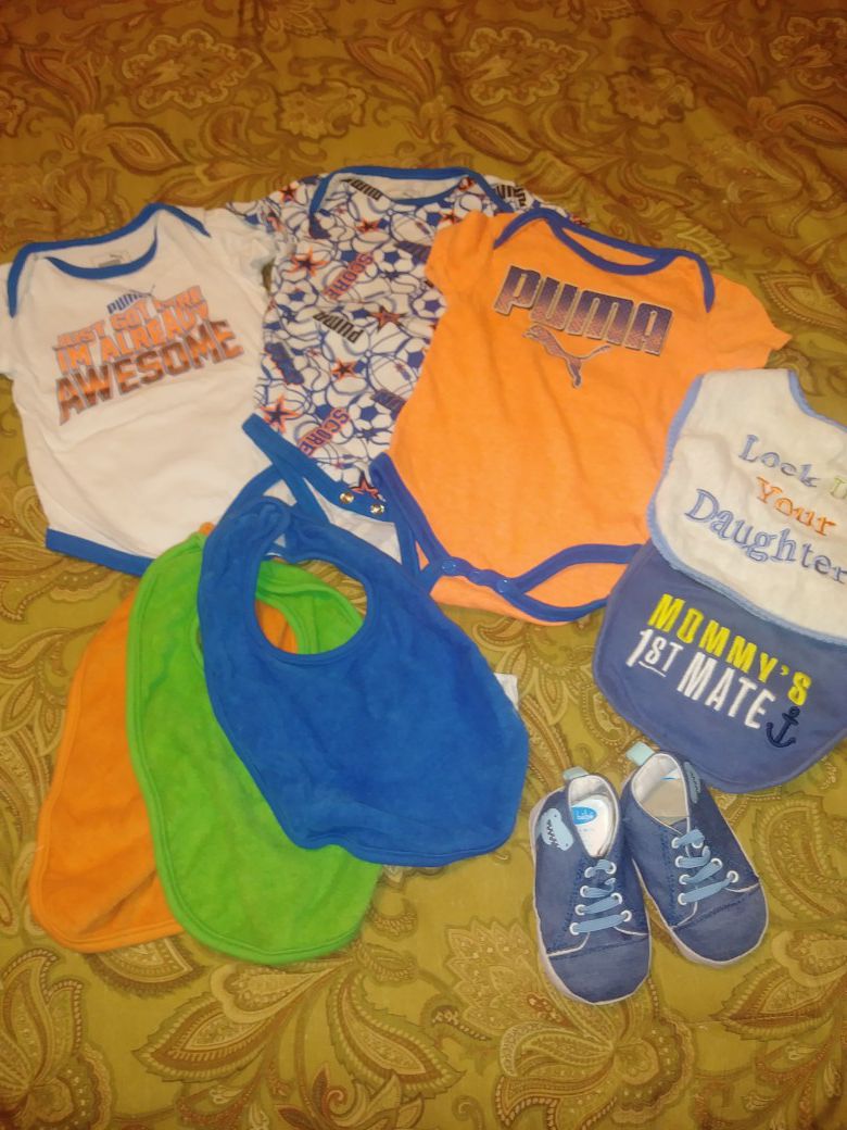 Lot of 9 new baby clothes. Onsies bibs and shoes