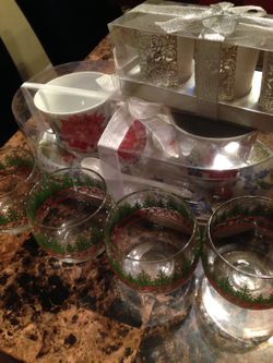 Assorted cups and candle holder