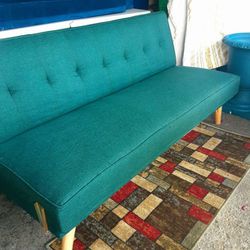 Green Sofa Bed.  67 1/2 L  27 X  24 1/2 ... BED SIZE 63 X 38 .. A