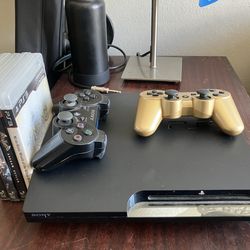 Playstation 3 with games and controllers