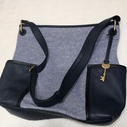 Fossil  crossbody bag two side leather pockets top magnetic buttons blue .