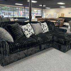 Midnight Madness Sectional New Condition. Delivery & Set Up Available 