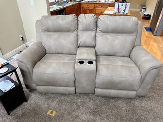 Beige Leather Reclining Loveseat