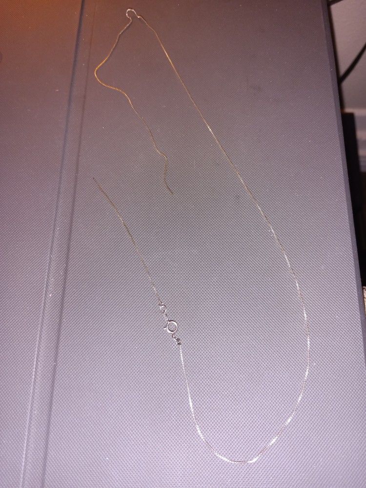 Silver Necklaces And Silver Rosary