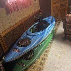 2 Kayaks With Paddles