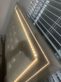 Queen bed with LED light on headboard