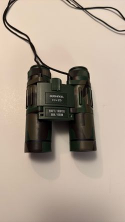 BUSHNELL 10x25 with case