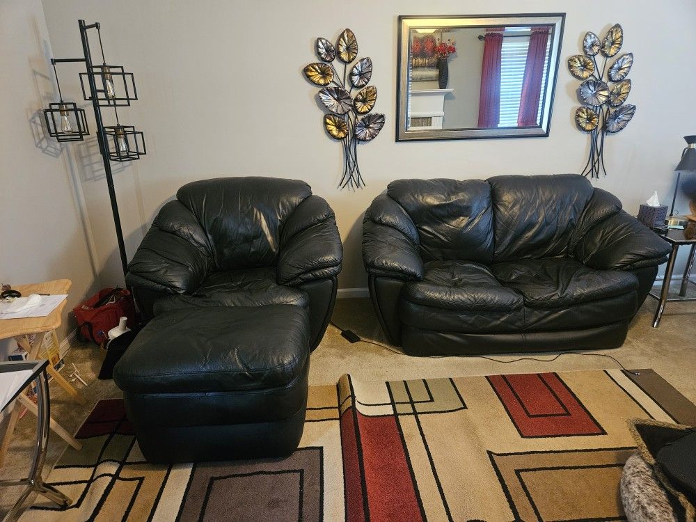 Black Leather Loveseat, Chair and Ottoman.