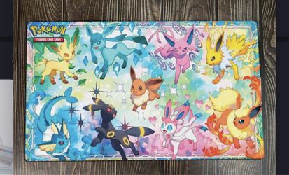 Eeveelutions playmat and eevee deckbox