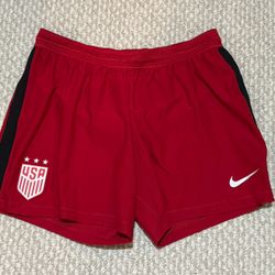 NWOT Woman’s Red Nike Running Shorts Lg. 